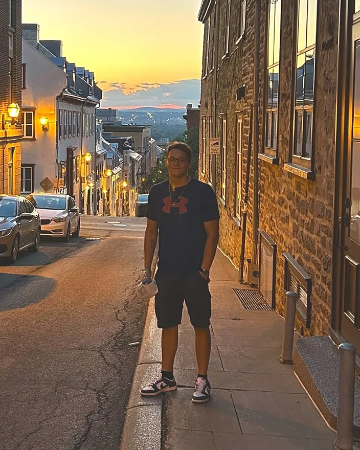 Ryan Martin, founder of Wavelength, on a street at sunset